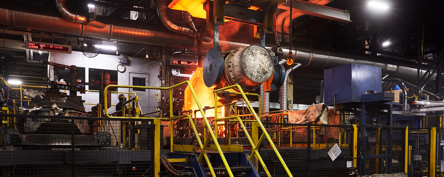 Overhead cast iron delivery system feeding the HWS pouring boxes in the iron foundry