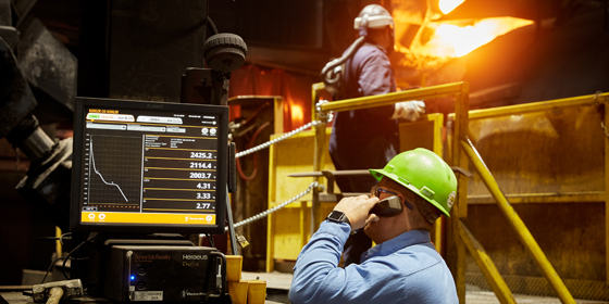 Foundry operator conducting an iron quality check in the Melt Department.